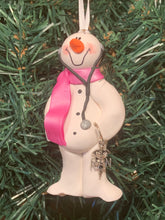 Load image into Gallery viewer, Registered Nurse Snowman Tree Ornament
